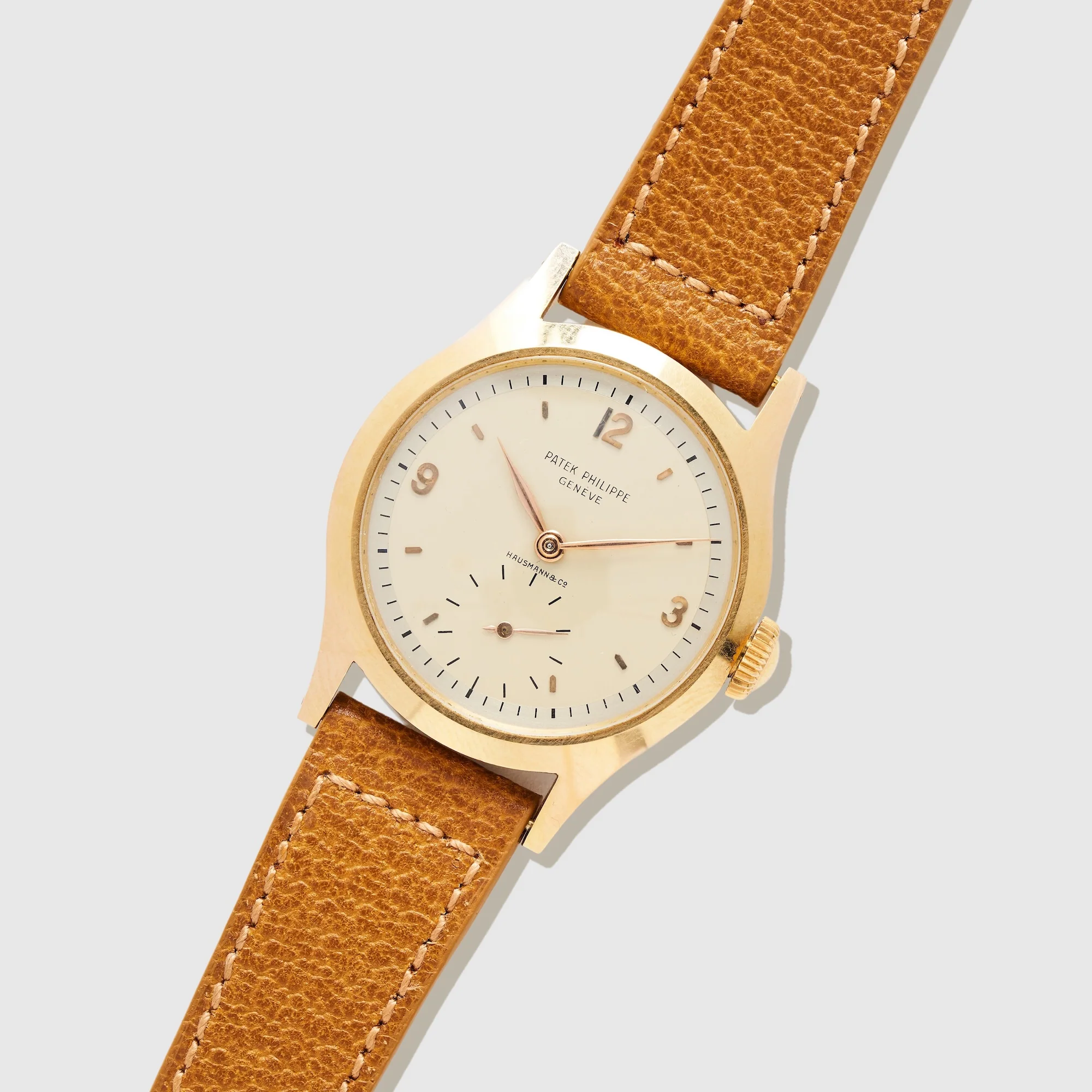 Patek Philippe Rose Gold Calatrava Ref. 565 Retailed by Hausmann & Co. with Original Certificate from 1953